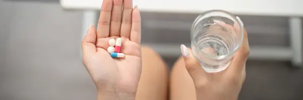 Taking medication woman