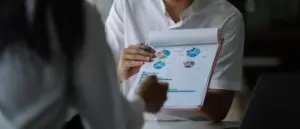 Female Doctor comparing charts or lab results